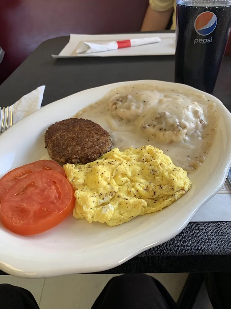 Single Biscuit with Gravy Sausage Patties and Tomato to Give Acidic Balance Such a Great Combo